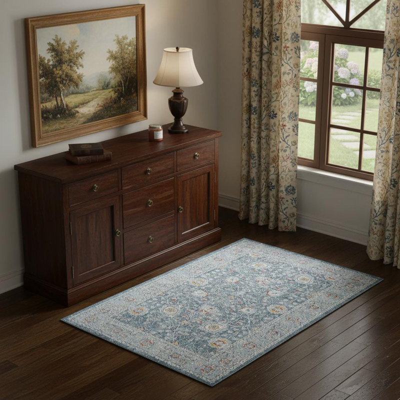 4' X 6' Blue And Ivory Floral Area Rug With UV Protection
