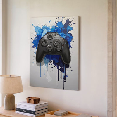 Manette de jeu bleue avec éclaboussure bleue et aquarelle