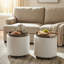 Repose-pieds rond avec rangement Kinkade-710523395