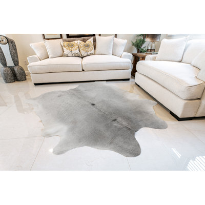 Tapis gris en peau de vache