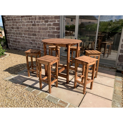 Hadden 6 - Person Round Solid Wood Patio Dining Set