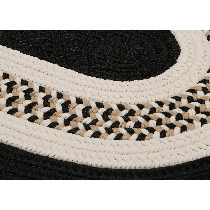 Bloxom Hand-Braided Black Indoor/Outdoor Area Rug, Round 5'