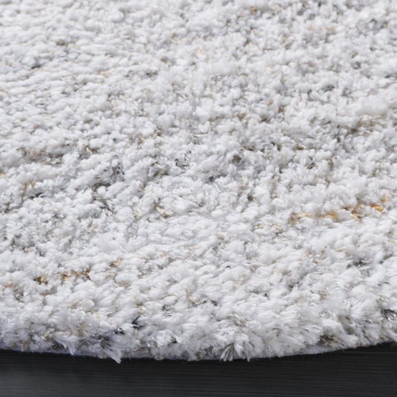 Tapis ivoire / beige en polyester tissé à la main à motif abstrait Algie, Rond 6 pi