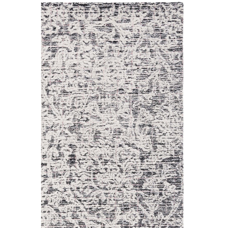 Caniah Hand Tufted Wool/Viscose/Cotton Floral Rug in Black/Ivory, Rectangle 5' x 8'
