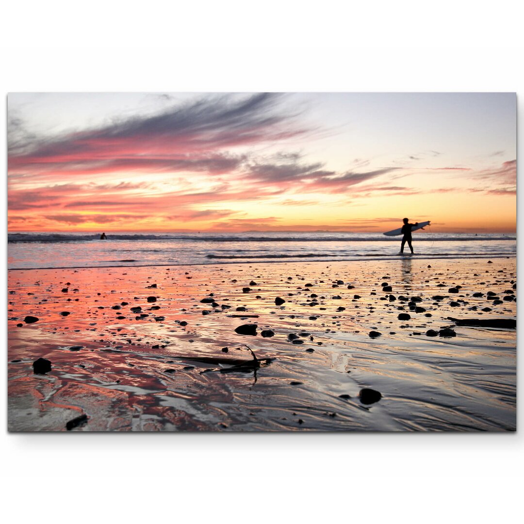 Leinwandbild Surfer im Sonnenuntergang