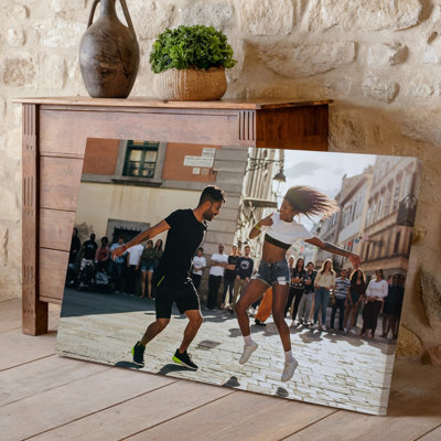 Canvas A Vibrant Street Scene Capturing Two Dancers In Dynamic Motion Wall Art The Male Dancer Leading With A Confident Expression And Canvas Wall Art