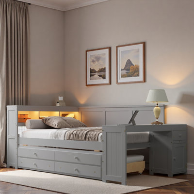 Lit de jour moderne avec tablettes de rangement, tiroirs, lit gigogne, station de charge, éclairage à DEL, bureau et armoire