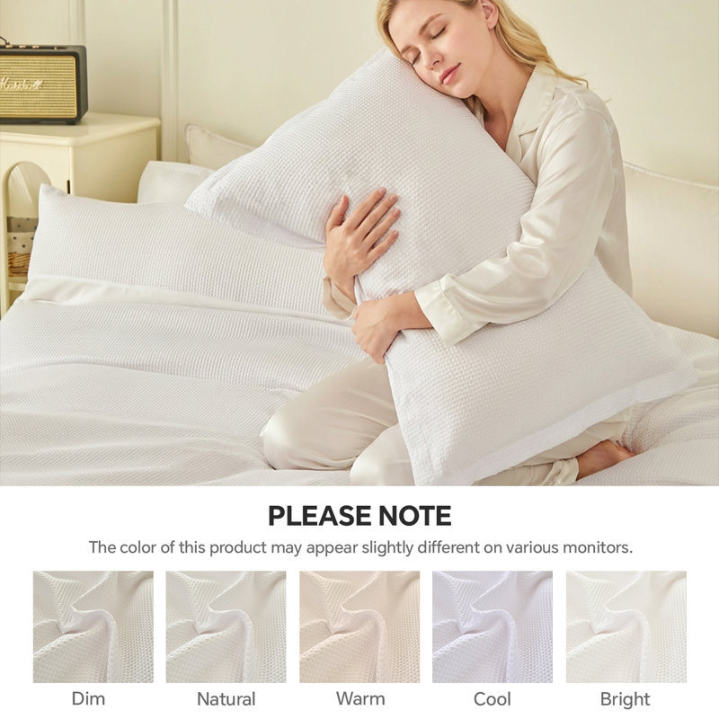 Ensemble de housse de couette élégant, adapté au style de chambre à coucher toute l'année, avec un motif tissé gaufré facile qui correspond à votre courtepointe (insert d'édredon non inclus), blanc