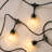 Ambience Pro 27 ft. Solar Outdoor Patio LED String Lights with 12 Warm White S14 Bulbs, 15 Hanging Hooks Included, Weatherproof
