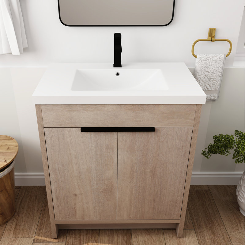Meuble-lavabo de salle de bain avec lavabo en résine blanche inclus. 30 pouces autoportantes, 2 portes d'armoire. Contreplaqué, tablette réglable. Poignées en métal. Étagère autoportante en chêne clair 30 po. Portes à fermeture en douceur,