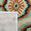 Tapis d'intérieur / extérieur à motif floral brun et bleu crocheté à la main Puri-19263006