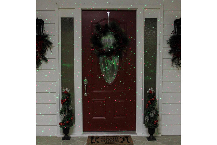 front door with festive projector lights