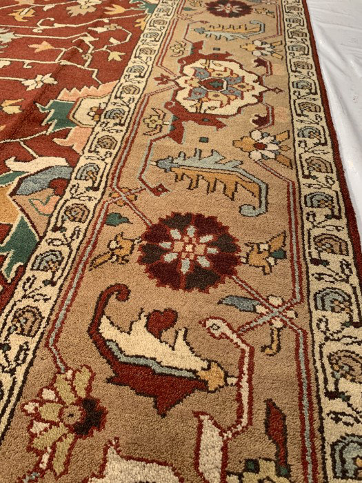 Wool Oriental Area Rug in Red/Beige