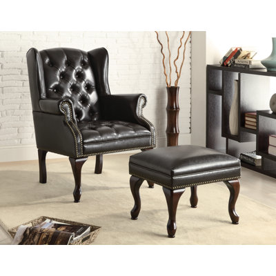 Fauteuil à oreilles et repose-pieds Acker