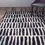 Tapis noir / ivoire / crème en laine fabriqué à la main à motif géométrique Odalis-392523910