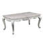 Table basse luxueuse en bois avec détails argentés - Pour les intérieurs modernes. Finition élégante et matériaux de qualité.