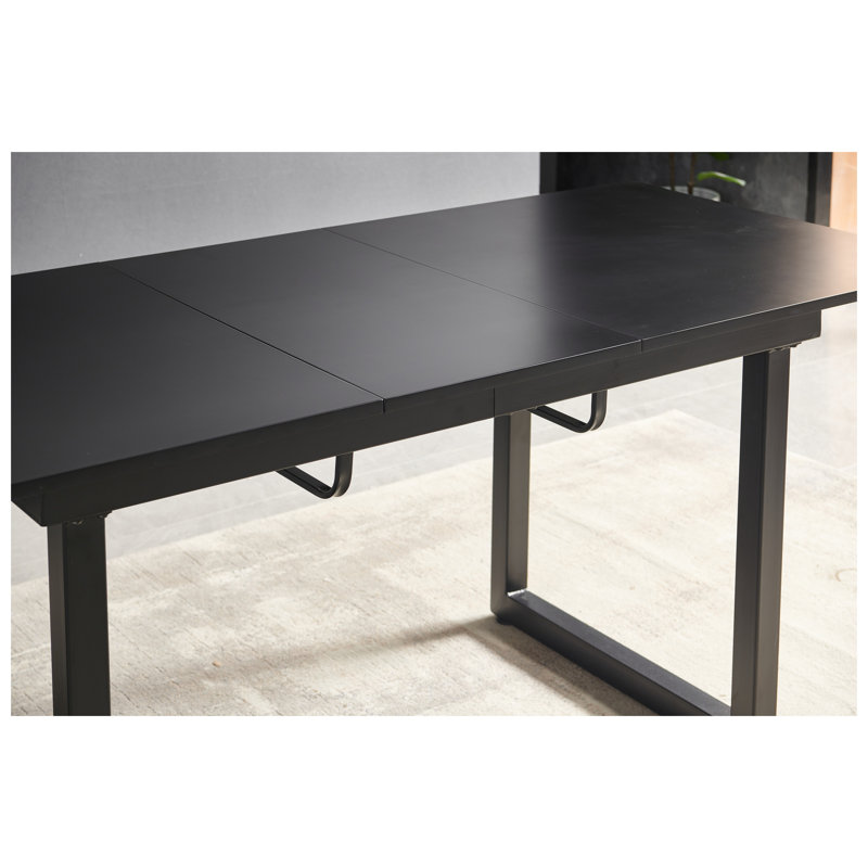 Table de salle à manger extensible noire avec pieds en métal