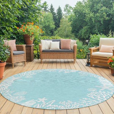 Tapis turquoise à imprimé animal Zendaya