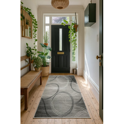Tapis gris à motif abstrait Dillup-Jones