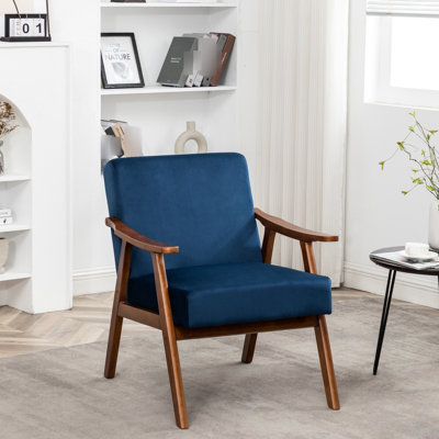 Le fauteuil d'appoint en velours bleu foncé avec structure en bois massif stable, pour le salon, la chambre à coucher et le cadre de l'entrée recouvert de velours profond, ajoute une touche de classe aux pièces