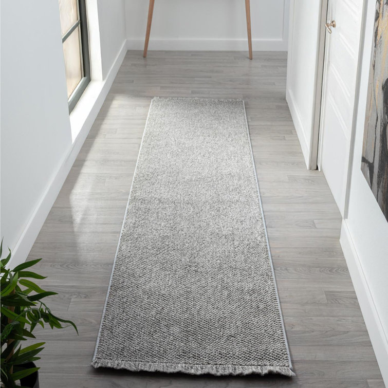 Tapis texturé à franges