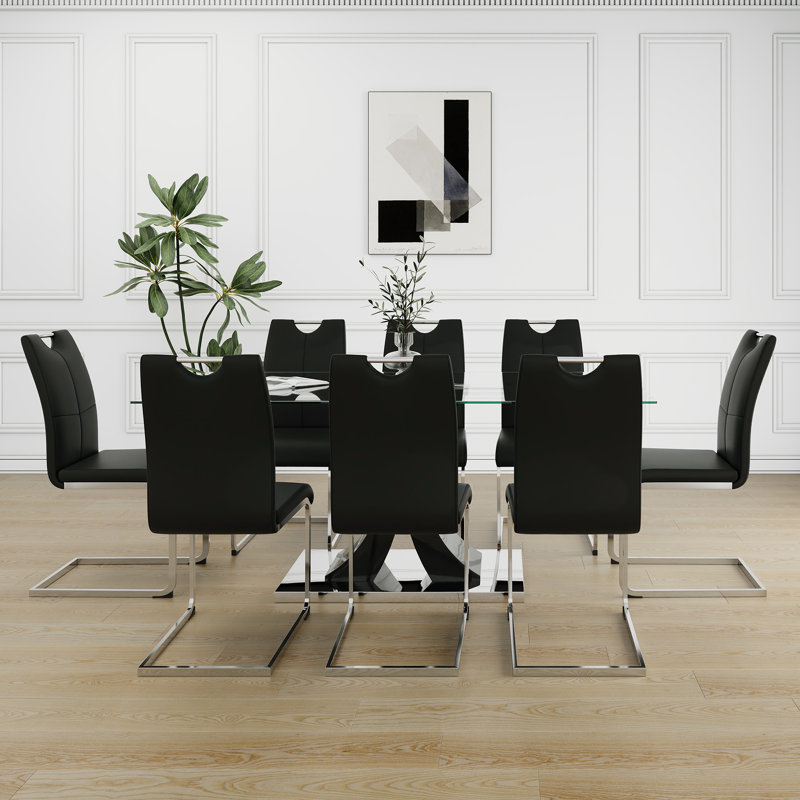 Ensemble de table moderne en verre: design transparent élégant avec base durable et chaises noires avec pieds galvanisés, parfait pour les cuisines de restaurant (ensemble de 9)
