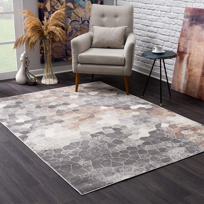 Tapis géométrique beige / gris en polypropylène tissé à la machine