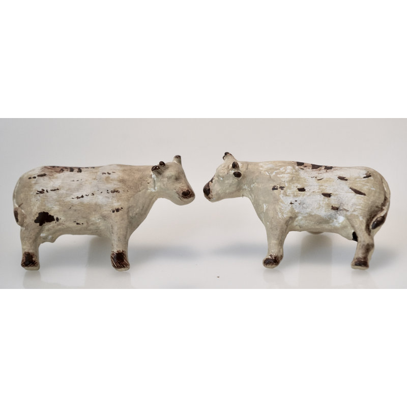 Paire de 2 boutons de vache blanchis