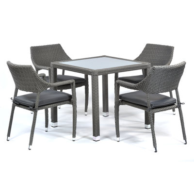 Vanya 4 - Person Patio Dining Set with Square Table , Cushions Included