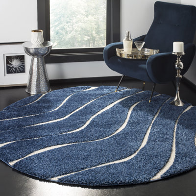 Ashal Abstract Cream Area Rug