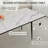 Expandable 47"–63" White Marble Mdf Dining Table With Black Metal Legs