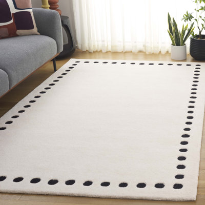 Tapis ivoire / noir en coton / laine touffeté à la main Lexy