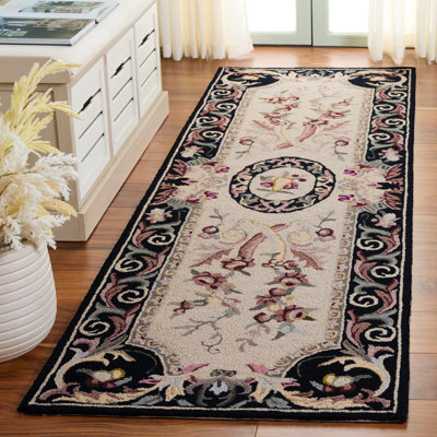 Caleb Oriental Handmade Hooked Wool Black Area Rug