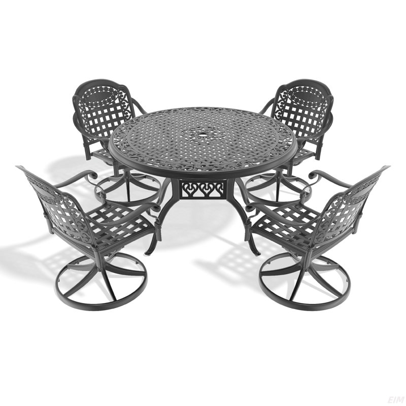 L'ensemble de salle à manger en fonte d'aluminium toutes saisons comprend des chaises pivotantes et une table avec un cadre noir