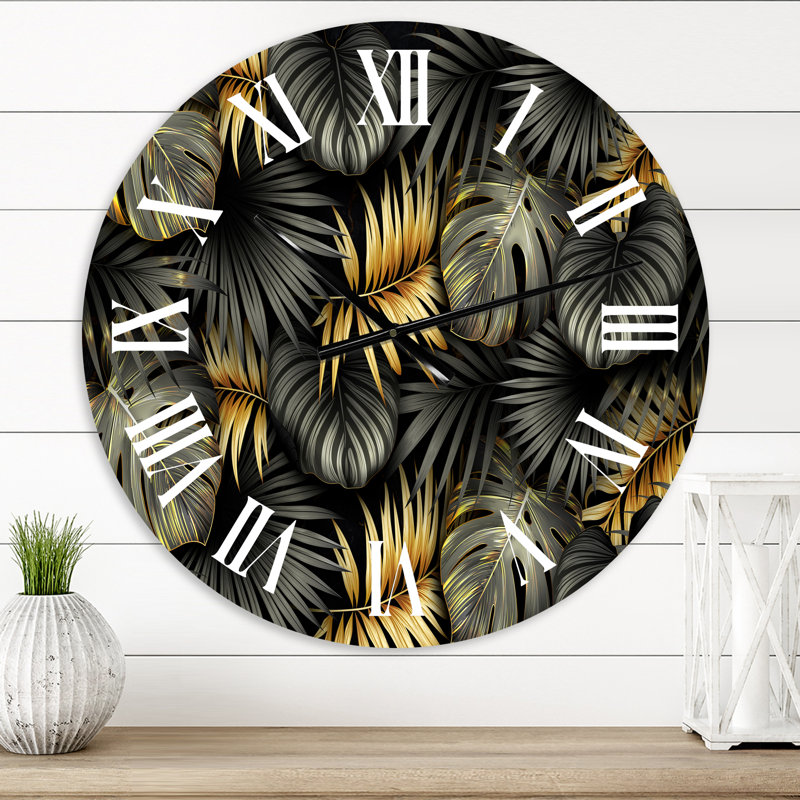 Feuilles tropicales noires et dorées II - horloge murale moderne, Moyen