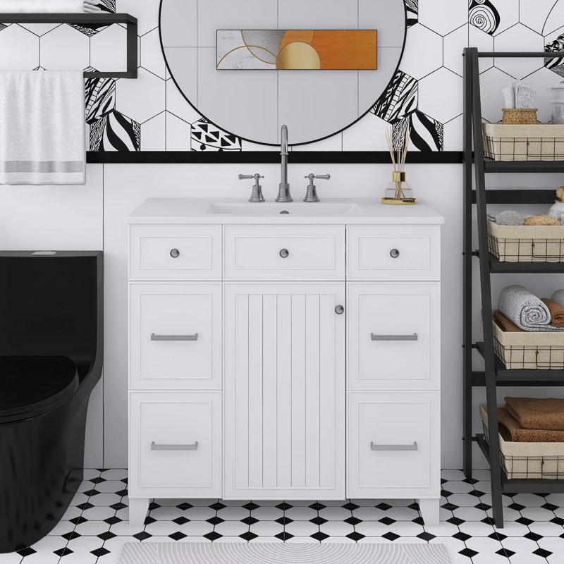 Meuble-lavabo autoportant de 36 po avec lavabo en céramique, portes à fermeture douce, tablettes réglables et 3 tiroirs.