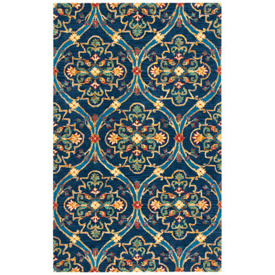 Drihmi Hand Tufted Wool/Cotton Geometric Rug in Green/Navy/Yellow
