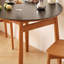 Table ronde en bois de cerisier-106973620-106973621