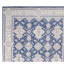 Tapis bleu et ivoire de haute qualité noué à la main