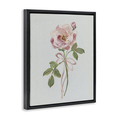 Bouton de rose rose avec ruban