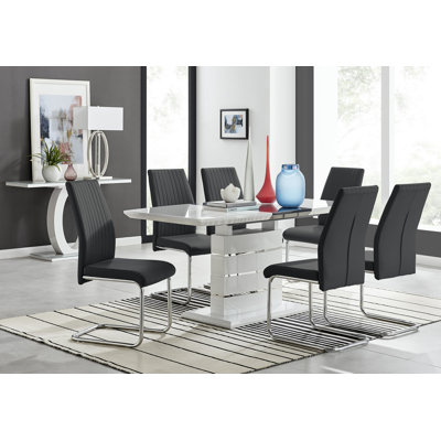 Ensemble de salle à manger extensible haute brillance Everson avec 6 chaises de salle à manger rembourrées en similicuir