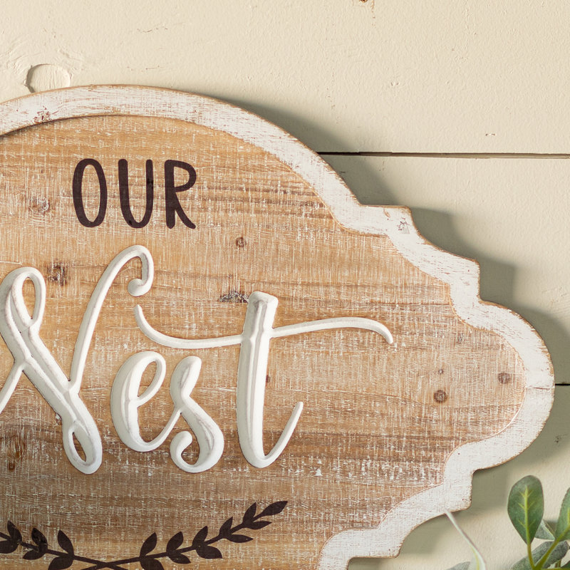 Signe en bois «NEST»