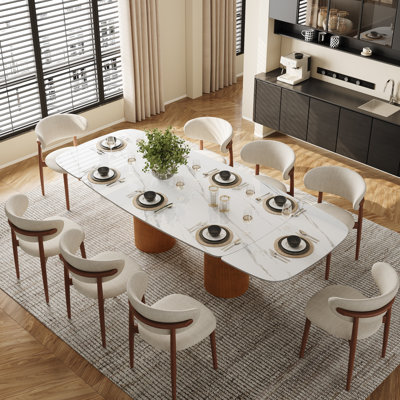 Ensemble de table de salle à manger extensible 94 po pour 8 personnes, plateau en pierre frittée de luxe avec double piédestal sculptural et 8 chaises rembourrées entièrement assemblées (ensemble de 9)