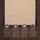 Nannette Handmade Light Beige Berber with Black Faux Leather Border Area Rug