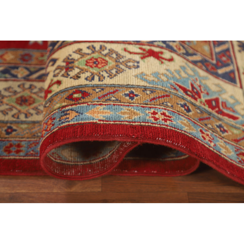 Tapis rouge à motif oriental Kazak
