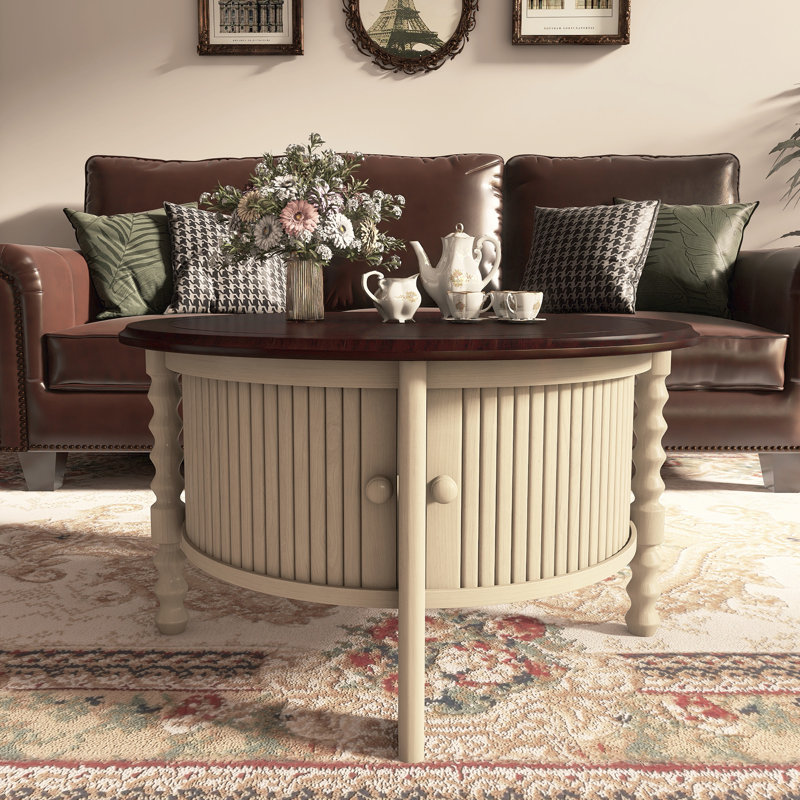 Table basse ronde avec porte coulissante