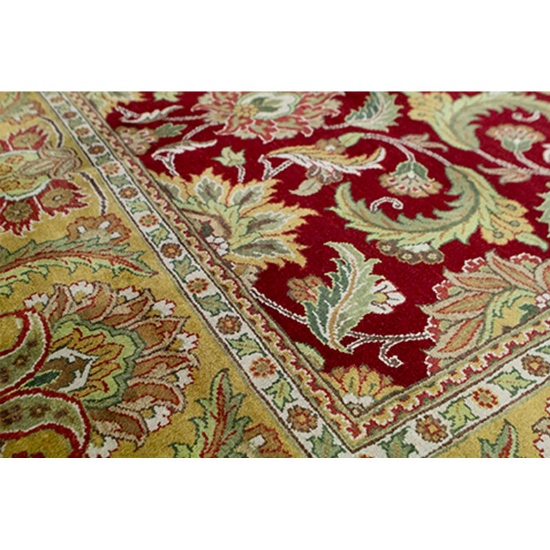 Tapis rouge et or de haute qualité noué à la main