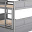 Lit superposé au-dessus d'un lit superposé gris avec lit gigogne simple - La taille de la chambre à coucher pratique permet d'économiser de l'espace-391896619
