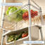 Étagère à quatre niveaux en acier chromé à double pente avec paniers réglables, tablette de rangement autoportante en acier au carbone pour cuisine, garde-manger et débarras.