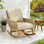 Chaise berçante moderne en osier avec coussins Rashad